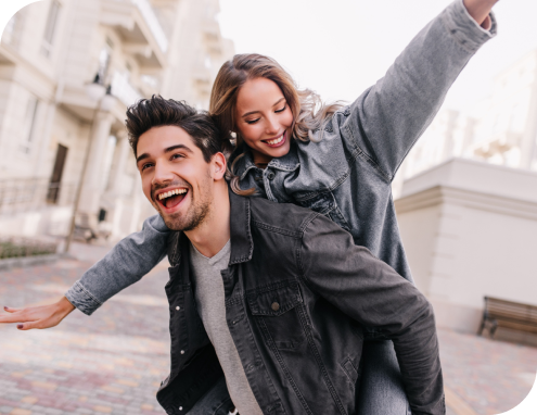 excited-man-black-denim-jacket-chilling-with-girlfriend-outdoor-portrait-happy-couple-exploring-city